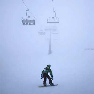 Man On Snow Board At Mt Buller Victoria